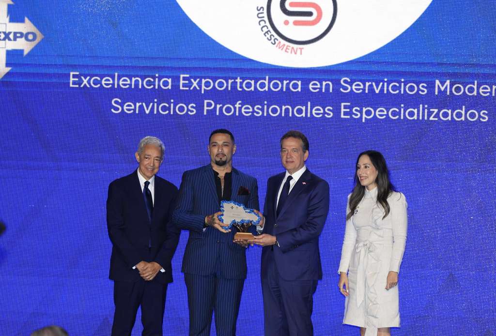 Jonathan Joel Mentor receiving an ADOEXPO recognition at an institutional event