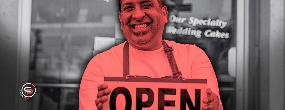 Startup founder is holding an open sign